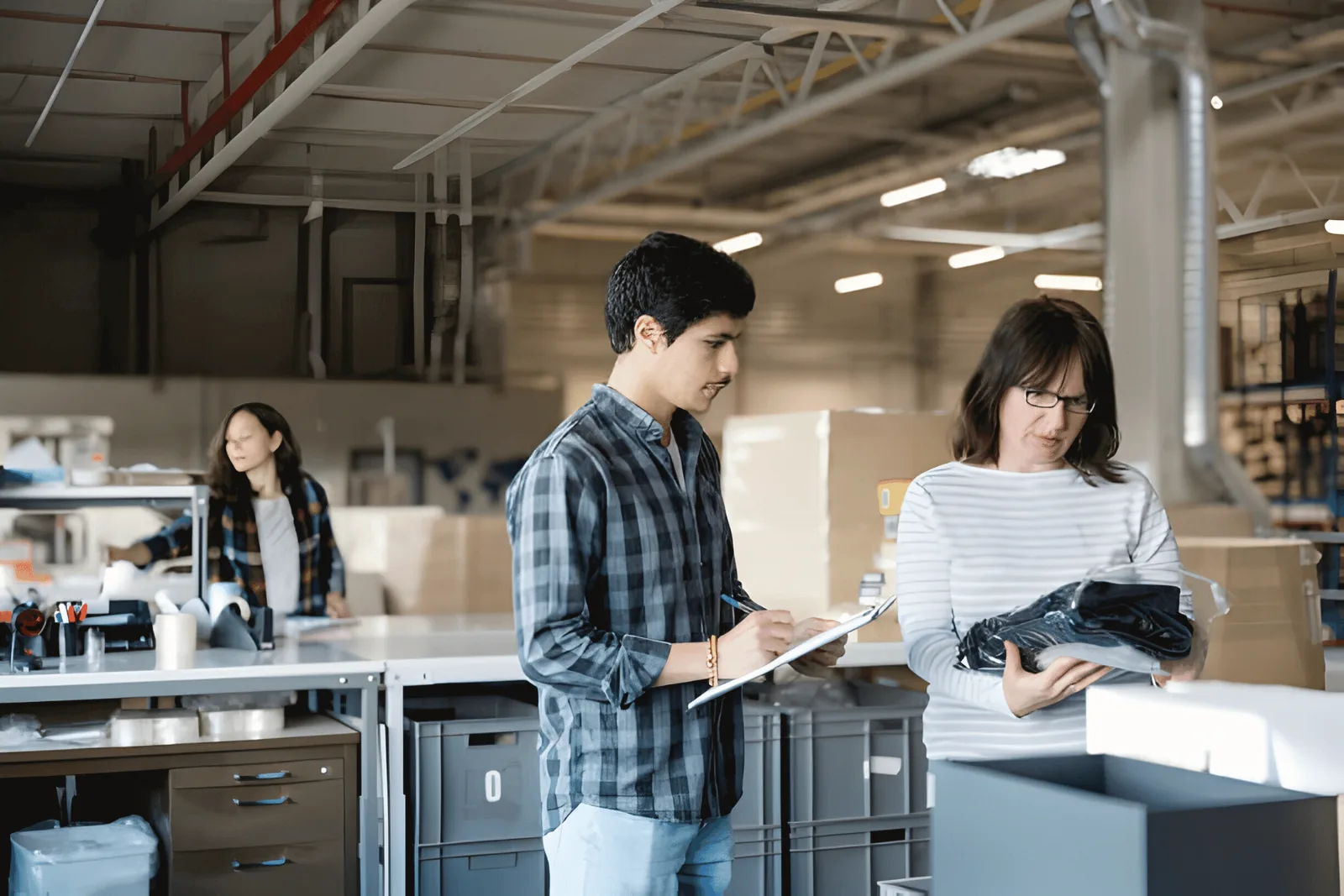 Quality team checking garments and documents before shipment to the EU